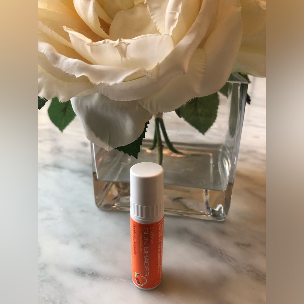 New Melaleuca~Sun Shades~lip balm/Sunscreen. SPF 15 cranberry tangerine .15 oz.